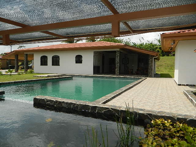 3 Bedroom  2-1/2 bath Volcano view home with a natural swimming pool
